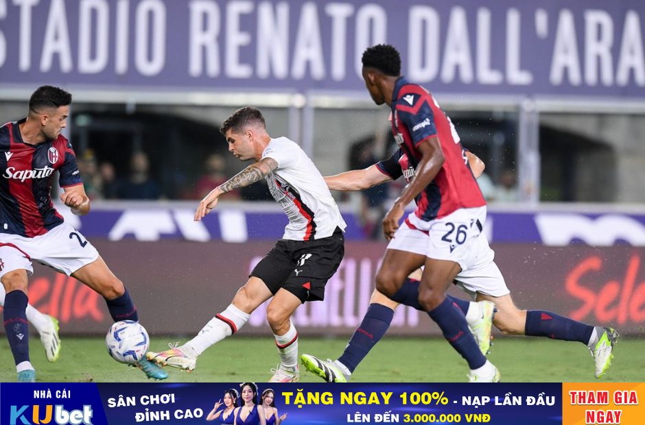 Kubet cập nhật hình ảnh các cầu thủ Bologna trong trang phục áo màu Đỏ-Đen đang vây công Pulisic bên phía AC Milan